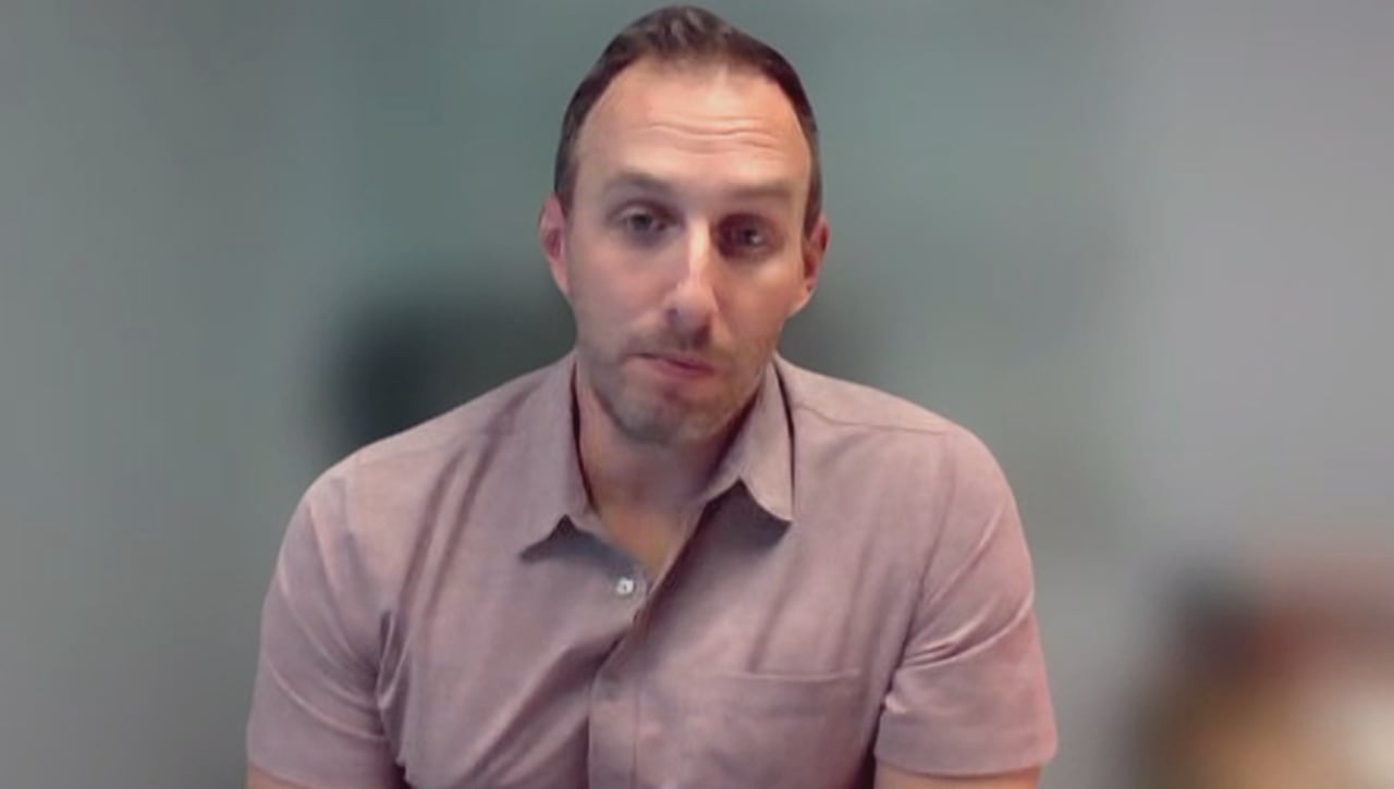 default-466 A man in a pink shirt.