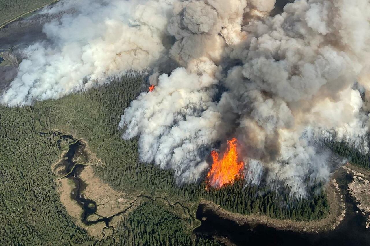 default-13 Aerial view of a wildfire in Dawson Creek, British Columbia, with smoke billowing across the sky.