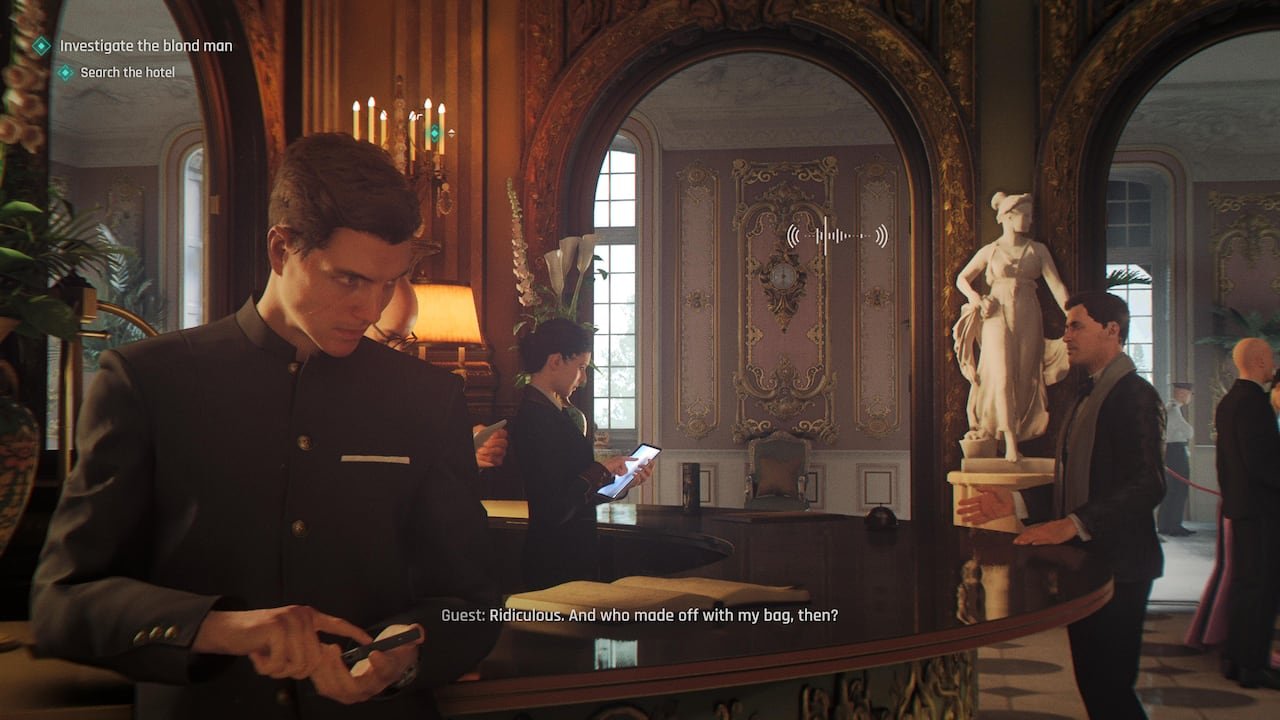 default-334 Screenshot of a man using his phone to eavesdrop on a conversation at a hotel reception desk.